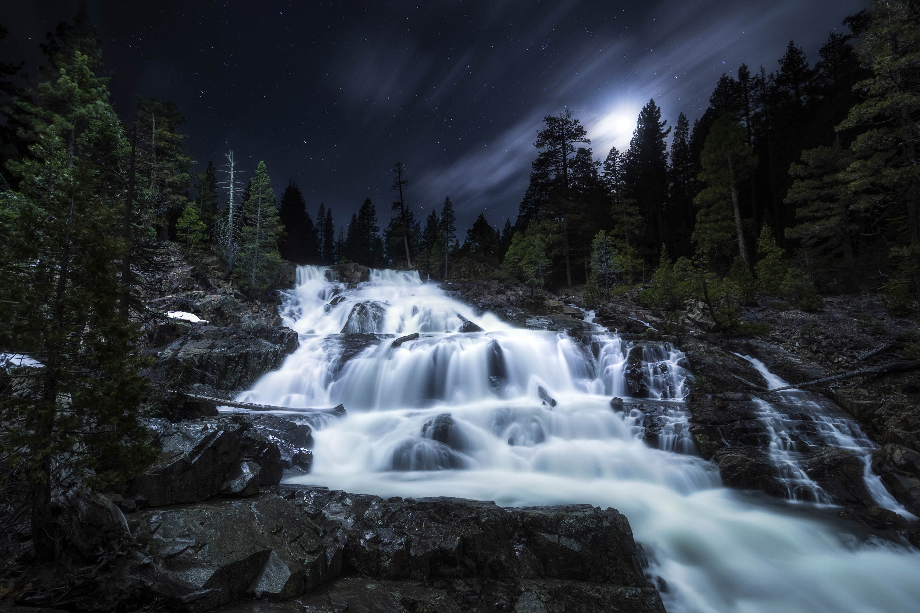 Glen Alpine Falls on a moonlit night in South Lake Tahoe, California.