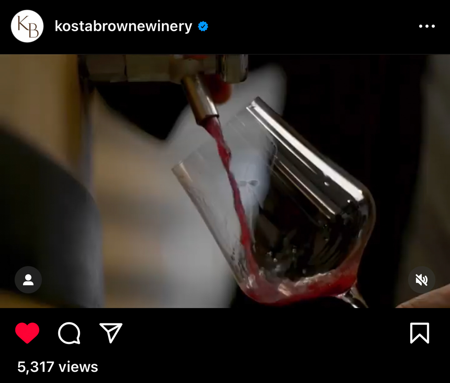 Red wine being poured into a glass for Kosta Browne Winery.